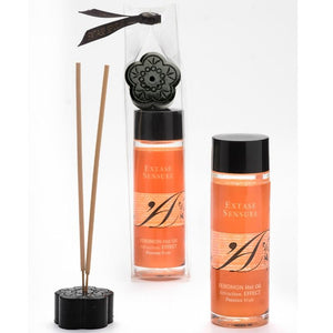 Coffret Extase Sensual Feromon Hot Oil Passion Fruit avec batonnets d'encens et support fleur, deux flacons orange effet thermique aux pheromones pour une ambiance massage sensorielle.