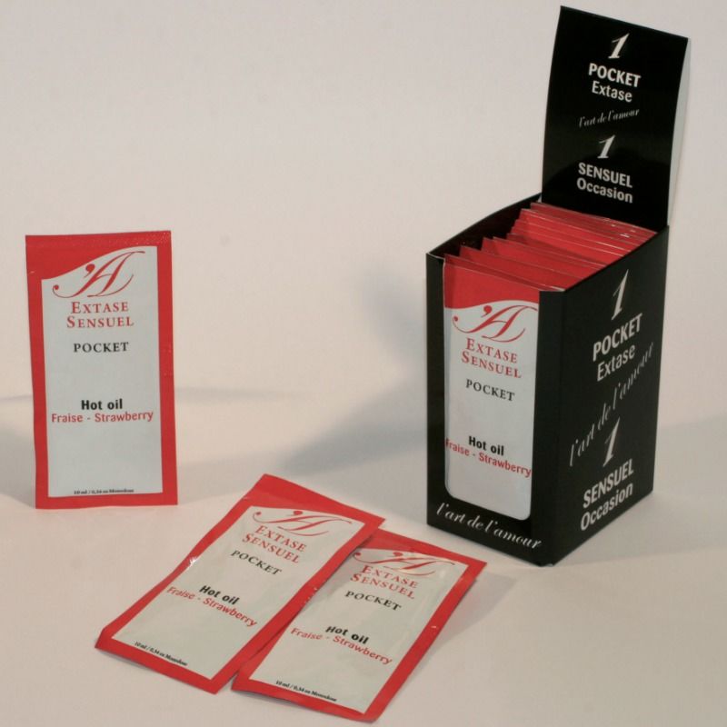 Trois sachets Extase Sensuel Pocket parfum fraise disposés devant le présentoir noir ouvert