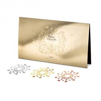 Etui dore Bijoux Indiscrets et ses tatouages temporaires Mimi en rosaces argent, bronze et or poses devant, decoration corporelle metallisee reutilisable a appliquer.