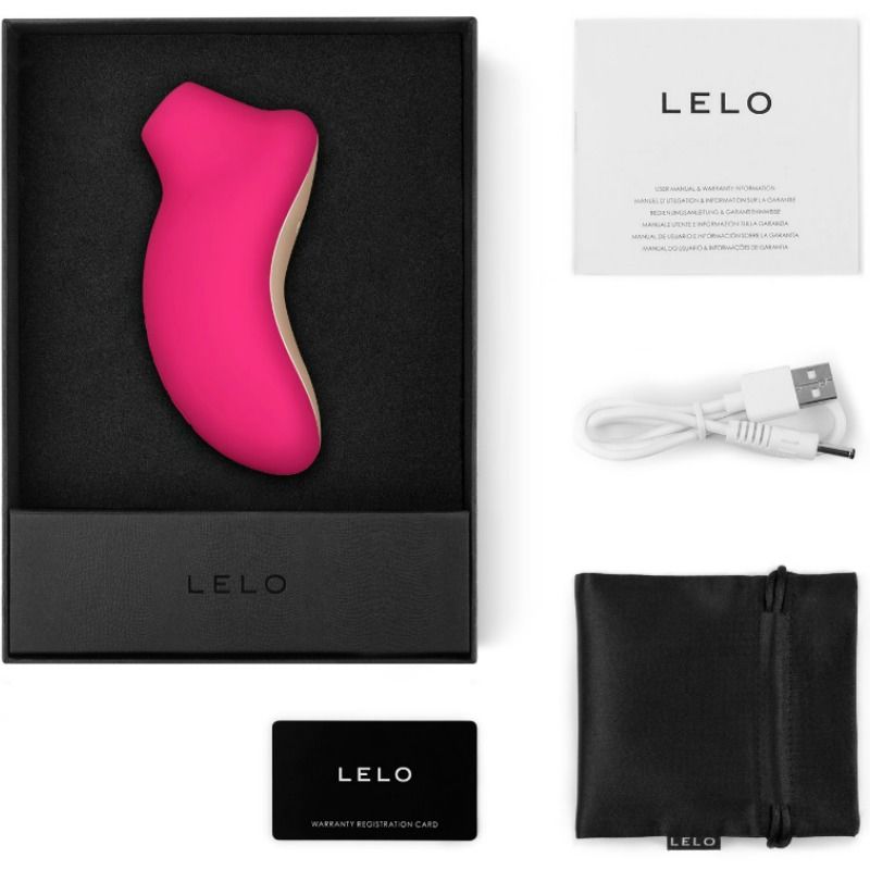 Stimulateur clitoridien Sona rose vif dans son coffret avec câble USB, pochette satin et carte Lelo, masseur sonique en silicone à embout d'aspiration arrondi.