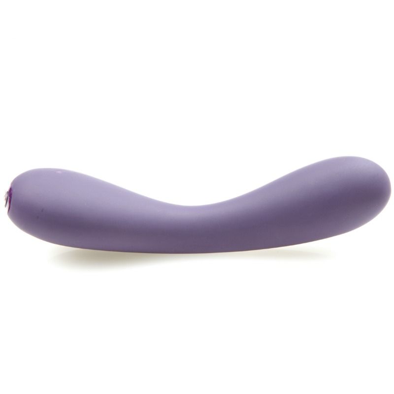 Vibrateur point G Uma lilas couché, tige fine et courbée en silicone doux à bout arrondi, design ergonomique fluide signé Je Joue, surface lisse non anatomique.
