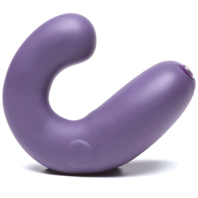 Stimulateur G-Kii violet plié en U serré pour cibler point G et clitoris simultanément, silicone courbable mat, design abstrait en crochet signé Je Joue.
