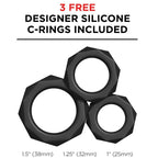 Visuel promotionnel montrant 3 anneaux péniens en silicone noir de tailles différentes (38, 32 et 25 mm) offerts en cadeau — ne représente pas le Suck-N-Pump lui-même
