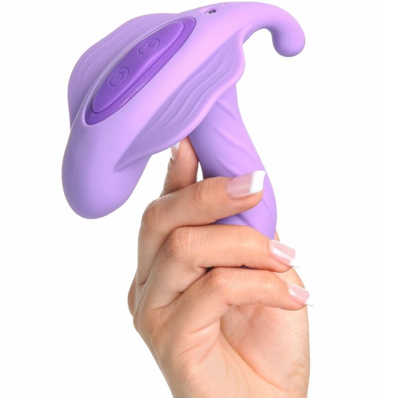 Stimulateur G-Spot Stimulate-Her tenu en main par le panneau de commande, bras courbé suspendu