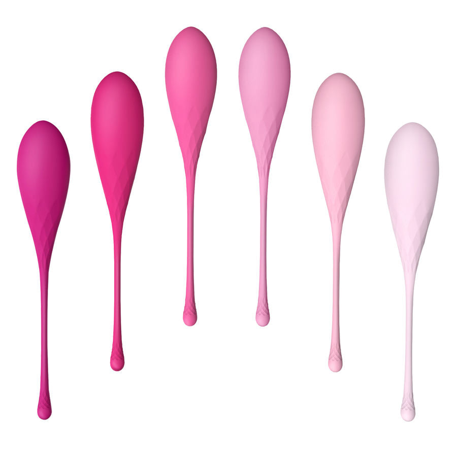Les 6 boules de Geisha en silicone alignees du fuchsia au rose tres pale, presentant la gamme de poids progressifs pour un entrainement musculaire graduel