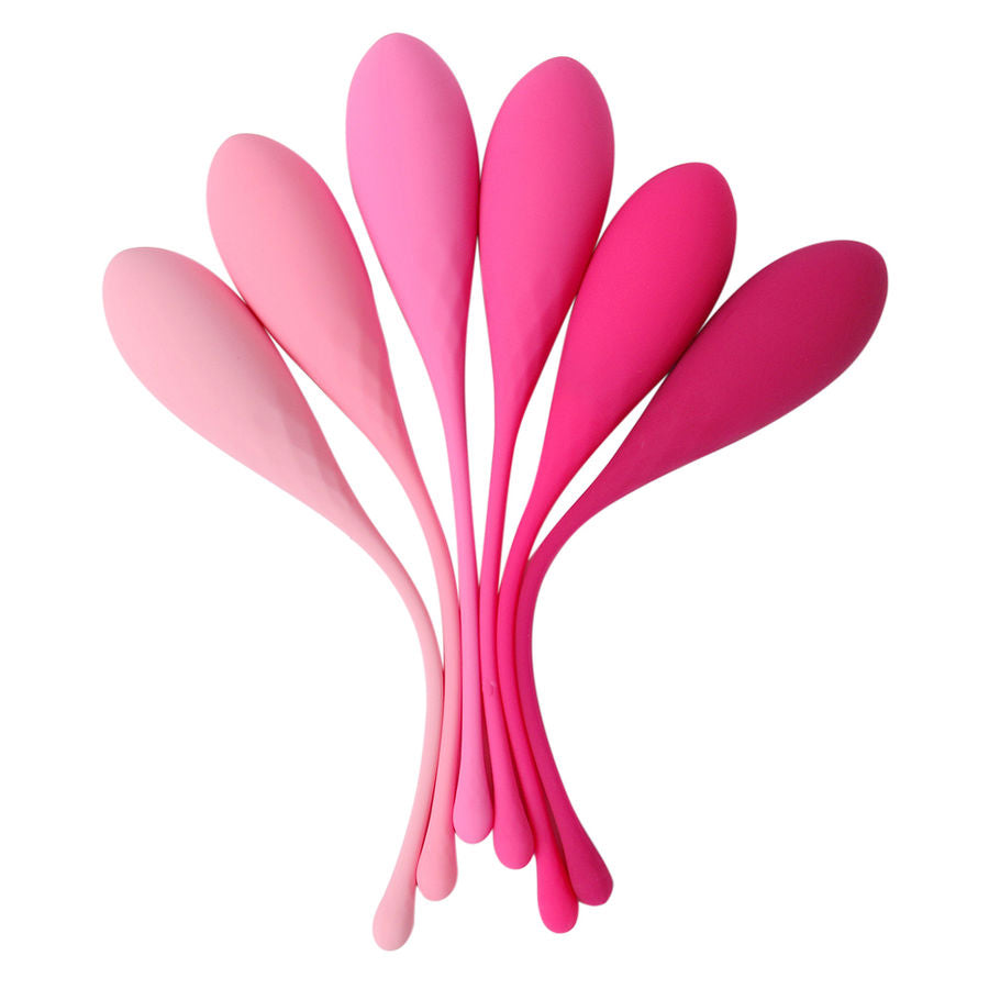 Les boules de Geisha en silicone reunies en bouquet effile, camaieu de roses du pale au fuchsia, mettant en valeur la forme goutte et les longues tiges souples