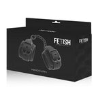 Packaging Handcuffs Fetish Submissive, boite noire presentant les menottes cuir vegan reliees par chaine metal, sans visuel anatomique