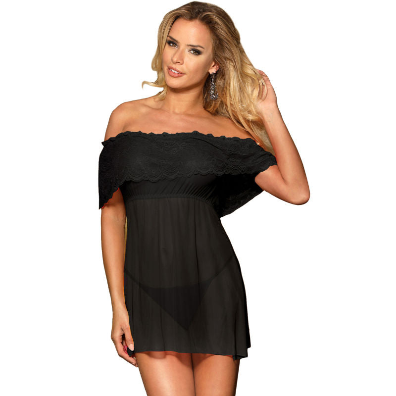 Robe noire Subblime epaules denudees, volant dentelle et jupe voile transparente, portee de trois-quarts par une modele, silhouette mise en valeur.