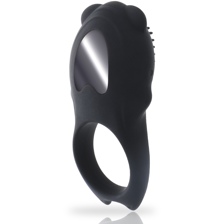 Anneau vibrant Colosseo noir vu de trois quarts, montrant l'anneau en silicone medical, le relief stimulant a picots et le bouton de reglage des 10 modes de vibration.