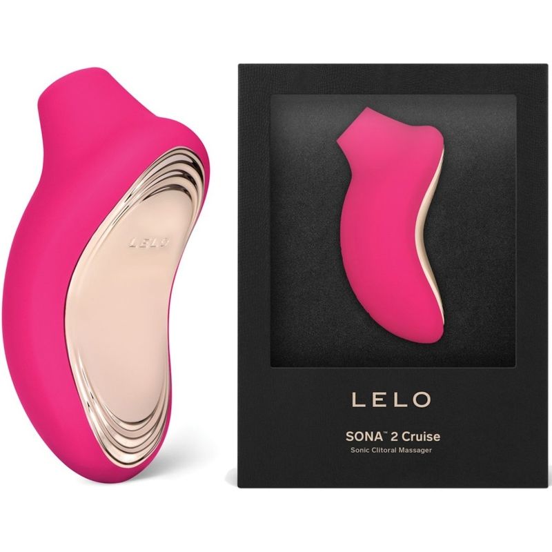 Stimulateur clitoridien Sona 2 Cruise rose vif présenté à côté de sa boîte Lelo Sonic Clitoral Massager, masseur sonique en silicone à façade dorée et embout arrondi.