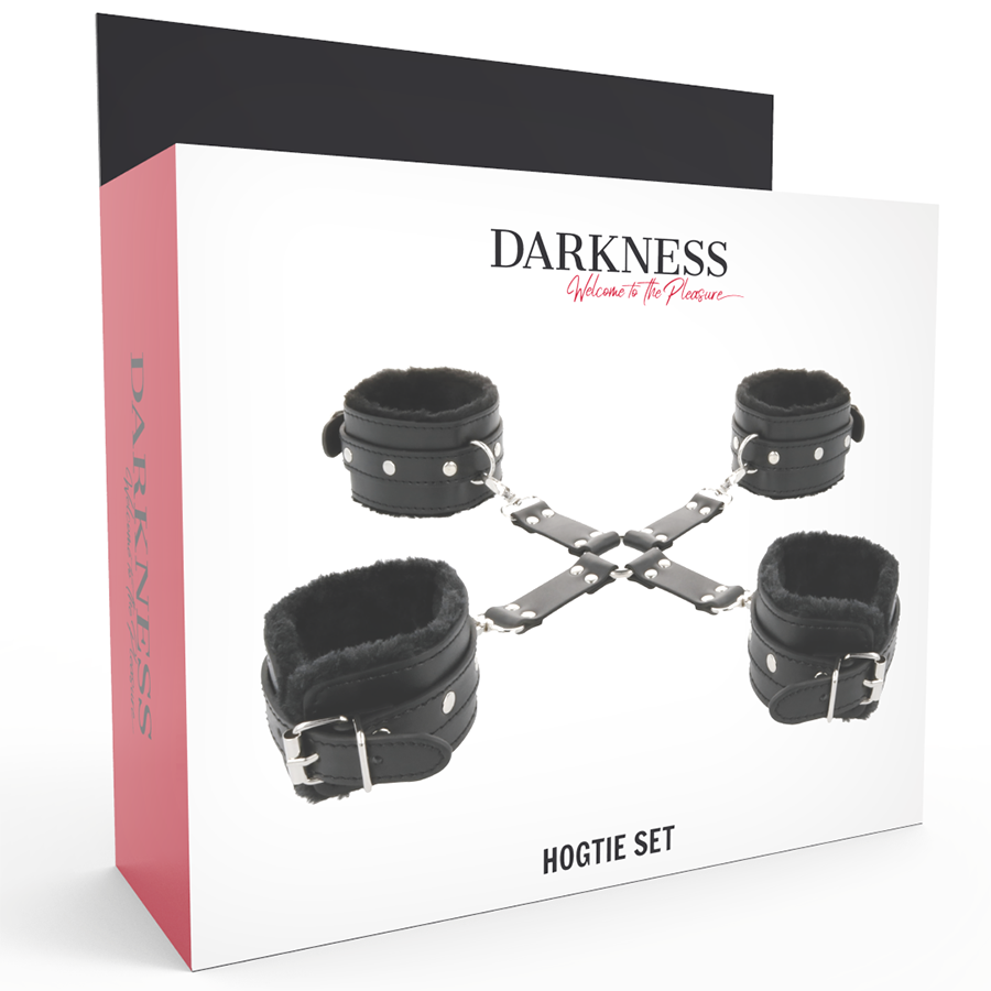 Boite Darkness Hogtie Set de face, montrant les manchettes cuir doublees fausse fourrure et la croix de sangles, packaging rouge et blanc pour le bondage.