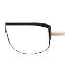 Gode-ceinture Fetish Submissive vu de profil, gode chair realiste a gland marque monte sur harnais noir fin, ensemble silicone reglable pour debutants.