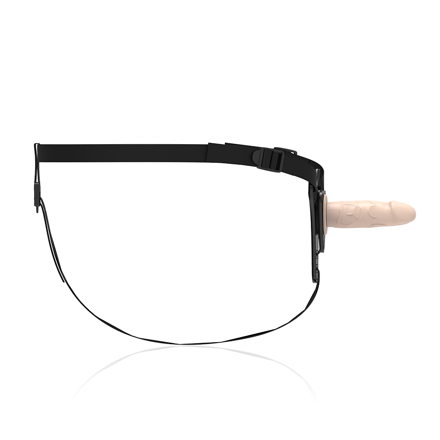 Gode-ceinture Fetish Submissive vu de profil, gode chair realiste a gland marque monte sur harnais noir fin, ensemble silicone reglable pour debutants.