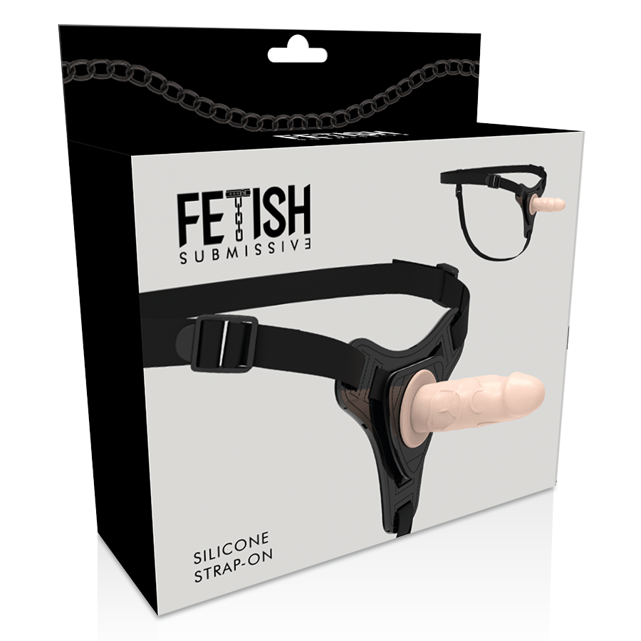 Boite du strap-on silicone Fetish Submissive presentant le harnais noir et son gode chair realiste, ensemble ajustable pour le jeu de penetration a deux.