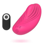 Vibromasseur Panty Vibe rose en forme de feuille nervurée, présenté à côté de sa télécommande noire, vue de trois quarts