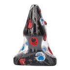 Plug anal conique etanche de 15,5 cm en PVC sous emballage a pastilles colorees, forme conique lisse visible, conditionnement scelle de la marque.