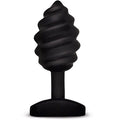 Plug anal vibrant G-Vibe en silicone medical noir, vue de face : corps torsade nervure et base evasee de securite, surface qui masse a l'insertion comme au retrait.