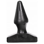 Plug anal All Black silicone vu de trois quarts, cone lisse a pointe marquee et socle plat evase, gabarit accessible de 12 cm pense pour debuter la penetration anale en douceur.