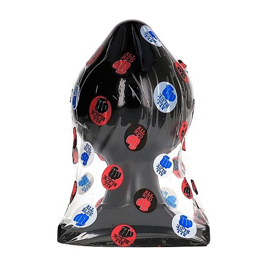 Plug anal tres large All Black sous film plastique a pastilles, forme de toupie genereuse et base evasee devinees, PVC noir souple de 22,5 cm pour une dilatation extreme.