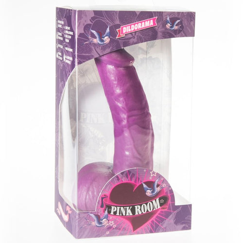 Boite Pink Room du gode realiste Connor violet, fenetre montrant le modele souple effet peau a ventouse, packaging Dildorama violet presente de trois quarts.