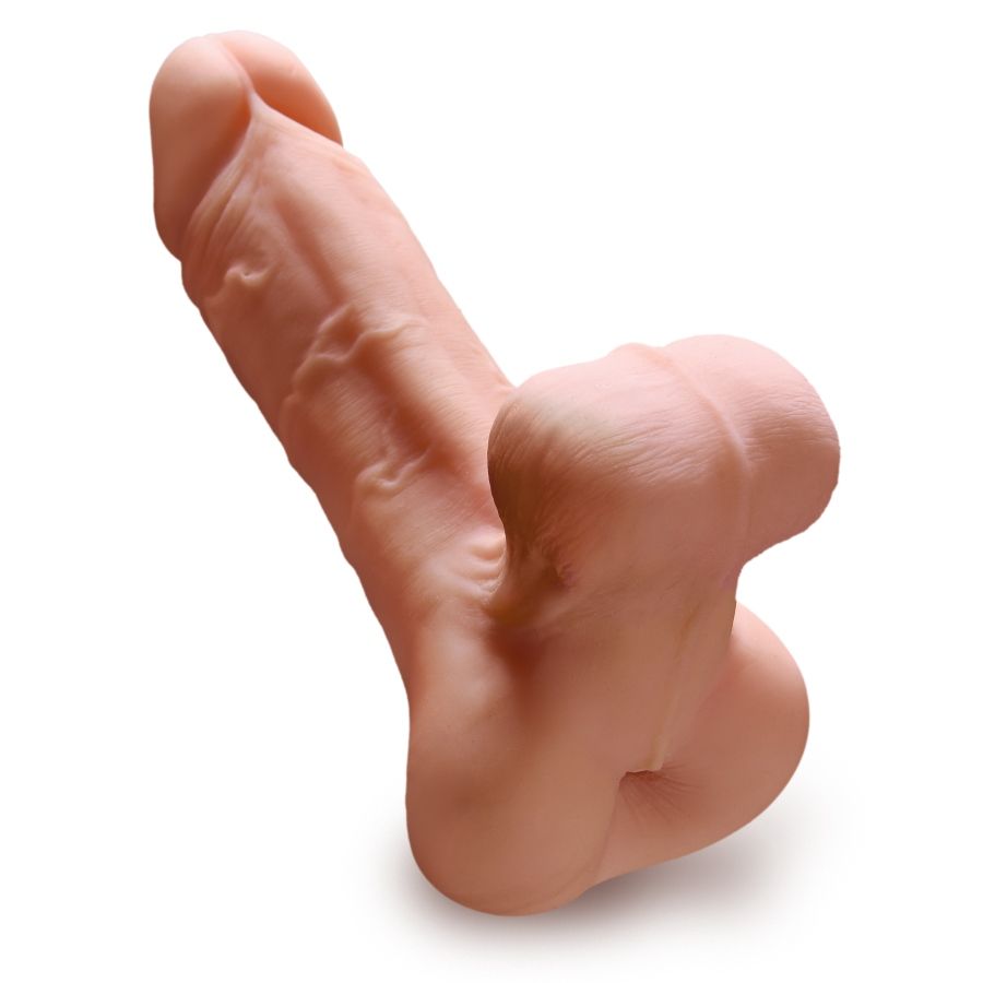 Phallus réaliste avec testicules, vu de trois quarts