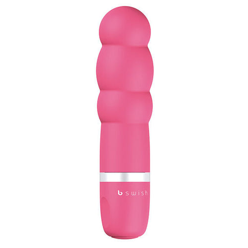 Mini vibromasseur Bcute Pearl rose vif à corps perlé en renflements successifs, base bswish argentée. Vue de face de la forme bulbeuse en silicone, coloris fuchsia satiné.