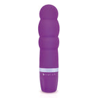 Mini vibromasseur Bcute Classic Pearl violet à corps perlé en plusieurs renflements, base bswish. Vue de face de la forme bulbeuse en silicone, étagement doux, coloris mauve.