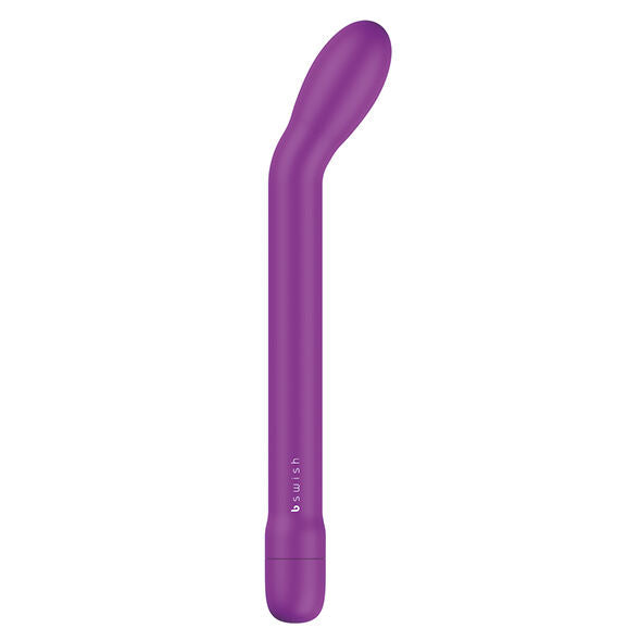 Vibromasseur point G fin violet, longue tige élancée en silicone à pointe légèrement courbée. Vue de face de la baguette mince à base bswish, coloris mauve uniforme satiné.