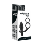 Boite Addicted Toys 10 cm du plug anal vibrant a double anneau penien en silicone noir, packaging avec pictogrammes materiaux TPR et ABS.