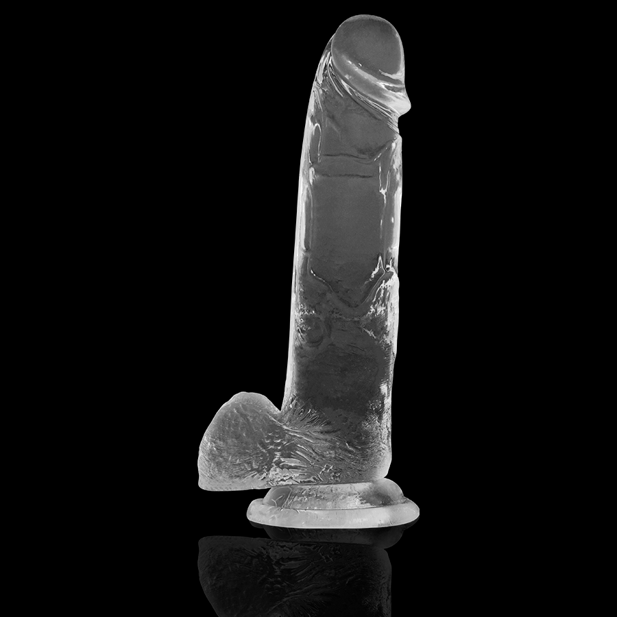 Gode realiste transparent X Ray avec testicules sur fond noir, gland prononce et veines saillantes contrastees, ventouse de fixation pour penetration mains libres