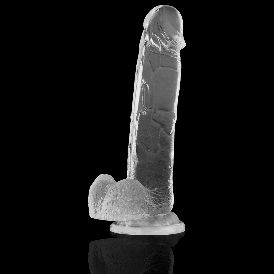 Gode realiste transparent X Ray avec testicules sur fond noir, vue de trois quarts, gland defini et reliefs veineux, ventouse plate de fixation mains libres