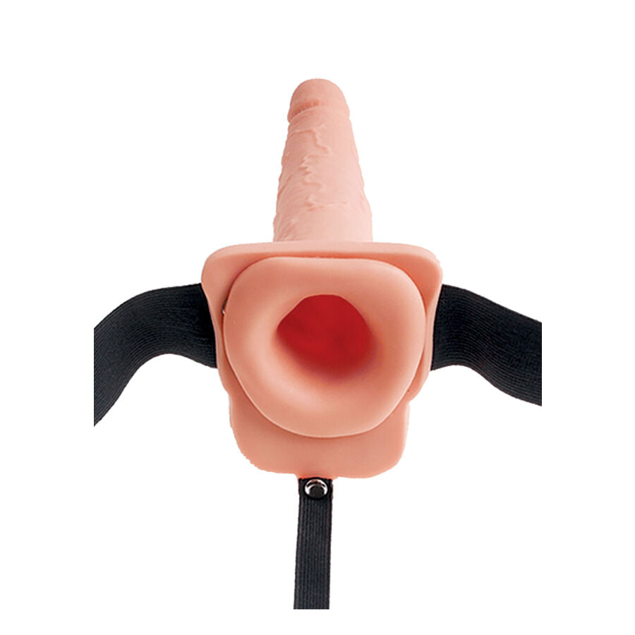 Gode ceinture, gros plan sur la partie creuse et les sangles