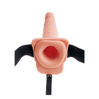 Gode ceinture, gros plan sur la partie creuse et les sangles
