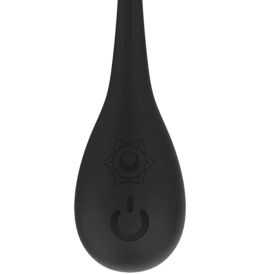 Gros plan sur la sphere superieure des boules Nisha noires, bouton power et logo mandala graves dans le silicone, detail du sextoy perineal vibrant