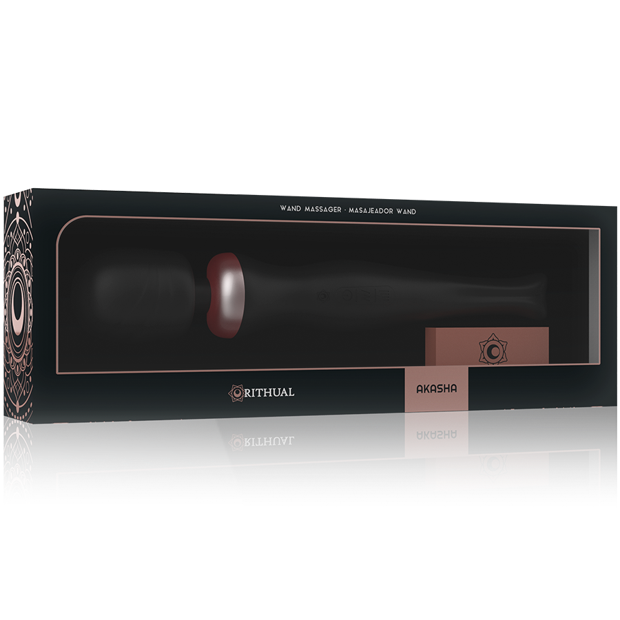 Boite noire du masseur clitoridien Akasha Rithual montrant le wand en silicone medical a travers la fenetre, design ornemental dore, accessoire rechargeable IPX6 submersible.