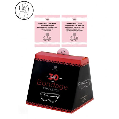Coffret 30 Bondage Challenge Secretplay vu de trois quarts avec deux cartes regles roses au-dessus, jeu de 30 defis de bondage progressif pour couple.