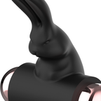 Anneau vibrant en silicone submersible noir et or — vue de profil