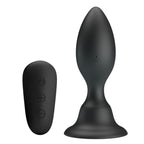 Plug anal vibrant Mr Play en silicone noir avec sa telecommande sans fil : corps en ogive a col etroit et base ventouse, 12 modes etanches pilotables a distance.