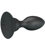 Plug anal vibrant Mr Play en silicone noir vu de dos sur sa base ventouse marquee CE, forme conique a col resserre, 12 modes de vibration etanches et rechargeables USB.