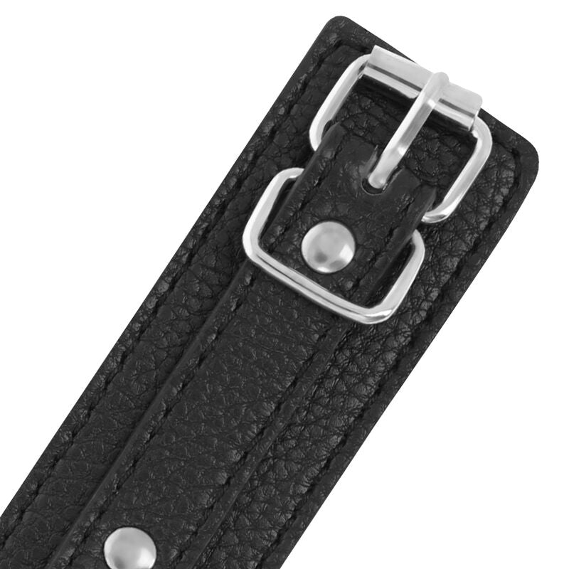 Menottes en cuir texturé noir réglables — vue de dos