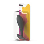 Plug prostatique fin anthracite sous blister B Swish jaune et rose. Vue du produit effilé maintenu dans la coque plastique transparente fixée à la carte illustrée.