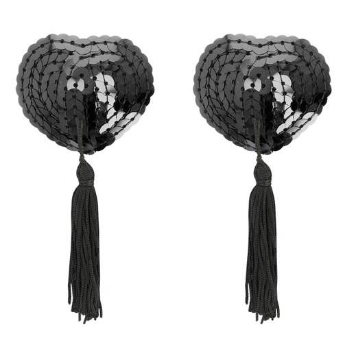 Paire de cache-tetons a paillettes noires Coquette posee a plat avec pompons, finition scintillante adhesive pour une touche glamour et burlesque sur une tenue audacieuse.