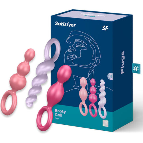 Boîte bleue du Satisfyer Booty Call Plugs, packaging avec dessin au trait stylisé et photo du trio de plugs anaux à perles colorées avec anneau de préhension.