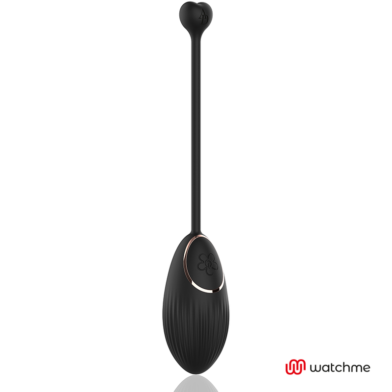 Mini vibromasseur oeuf en silicone noir et son fil a embout coeur, vue de face soulignant la forme compacte et la surface striee, vibration a distance.