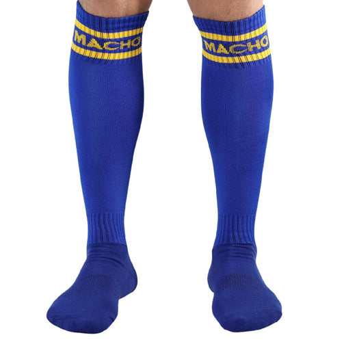 Paire de chaussettes hautes homme bleu roi bande logo jaune, vue de face jambes paralleles, fibre synthetique respirante style bas de football fetiche polyvalent