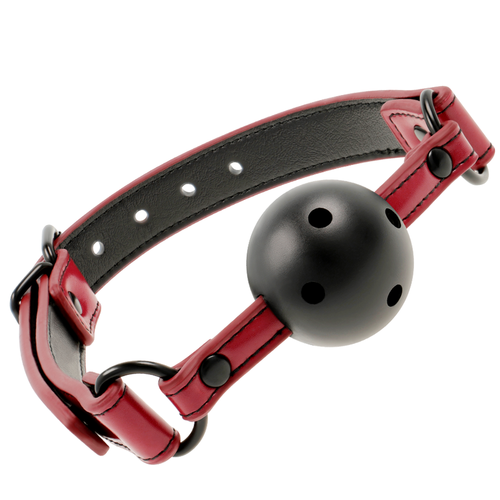 Baillon-balle Fetish Submissive a boule noire ajouree, sangles en cuir vegan rouge a oeillets metal, vis d'ajustement pour explorer le jeu de soumission.