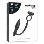 Boite Addicted Toys Anal Massager and Cock Ring presentant le plug a anneau penien silicone noir avec bullet, packaging epure du combo masculin.